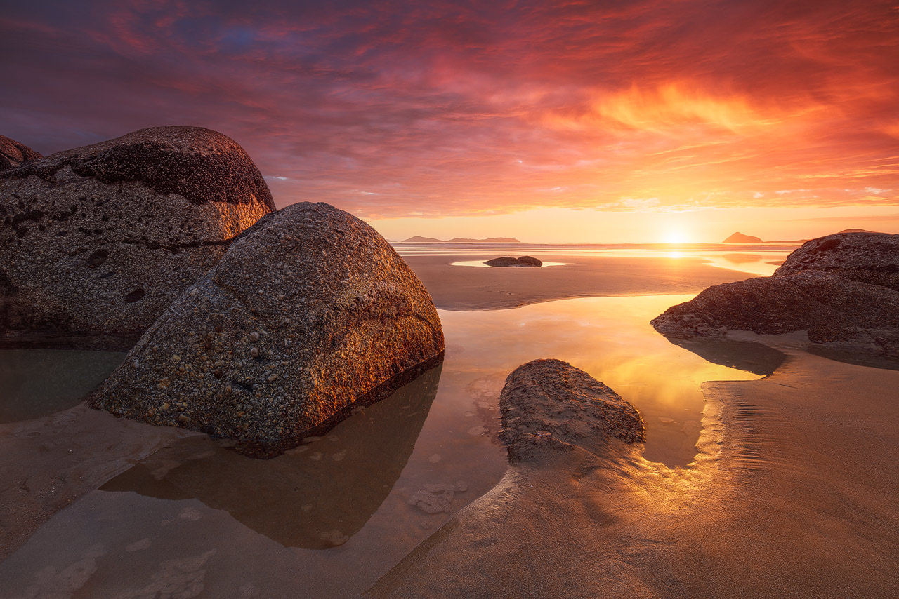 A spectacular sunset at Whisky Bay in Wilsons Promontory National Park in Australia.
