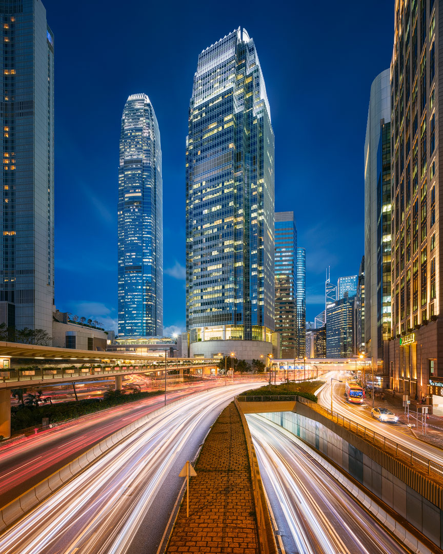 Connaught Road and The international Finance Center in Hong Kong during Blue hour.