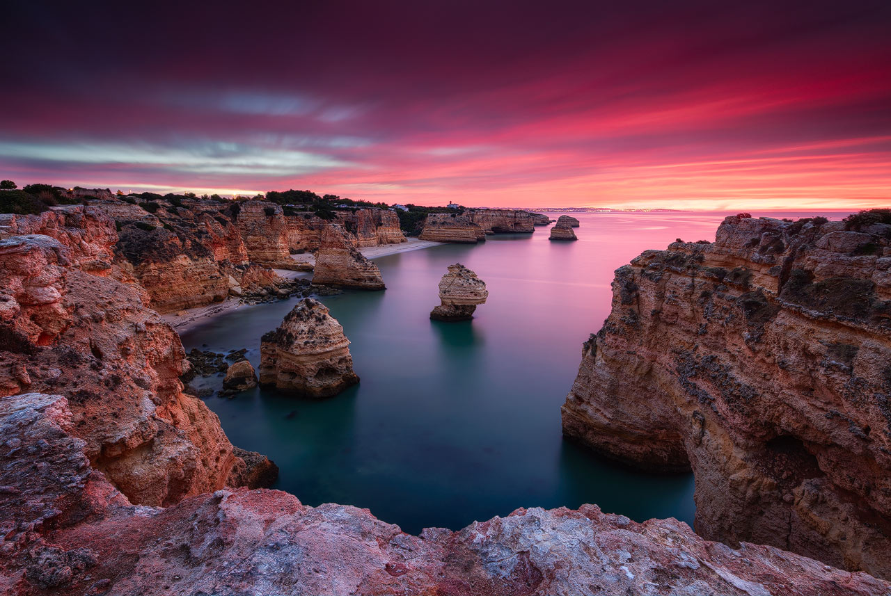 Praia da Marinha at the Algarve in Portugal during sunrise.