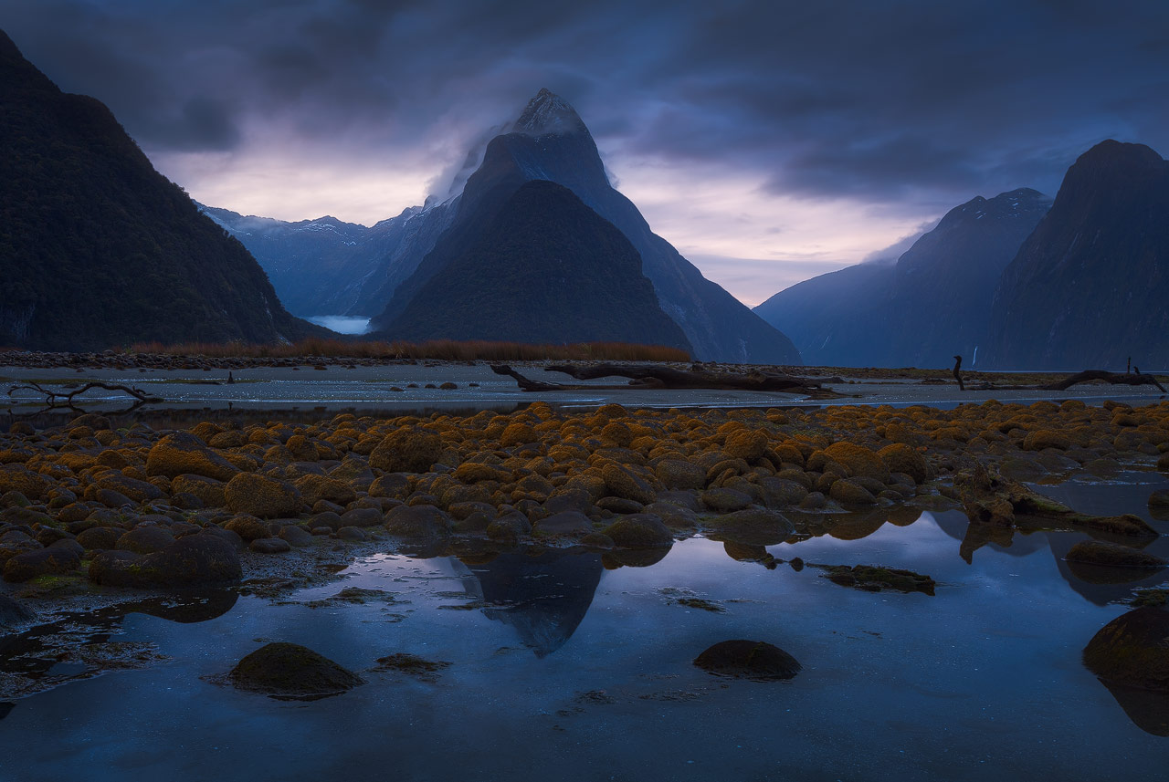 Milford Blues - New Zealand The fiord and the mountains of Milford Sound at evening.